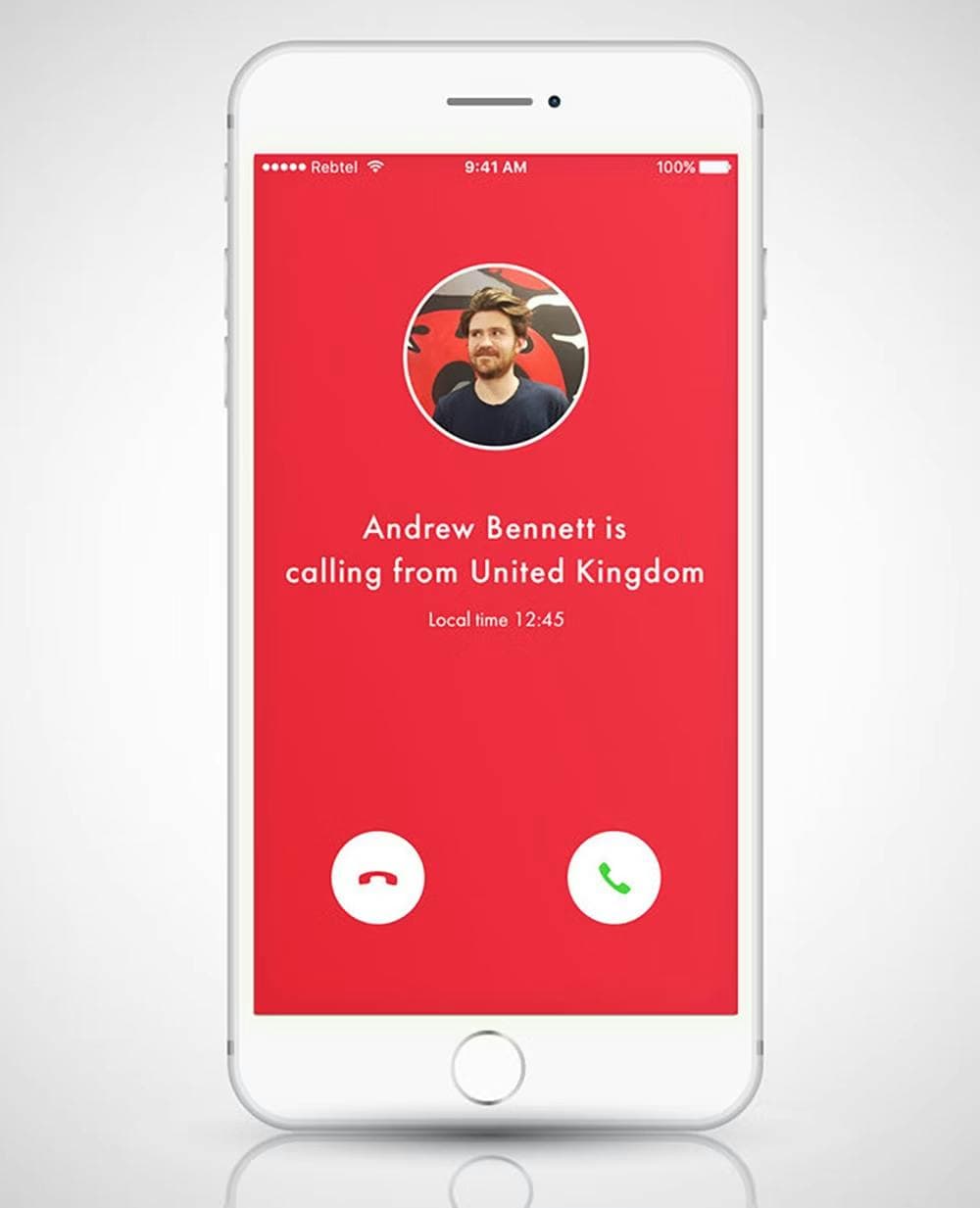 An iphone displaying the Rebtel app, where a customer is receiving a call from someone in the UK named Andrew Bennet.